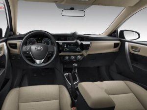 Toyota Corolla Altis 1.8MT  2016 - Bán ô tô Toyota Corolla Altis 1.8MT đời 2016, màu bạc, xe như mới đi 2,1 vạn km