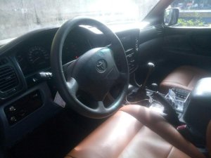 Toyota Land Cruiser   4500EFI 2002 - Bán Toyota Land Cruiser 4500EFI đời 2002, màu đen, số sàn, 2 cầu