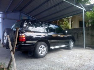 Toyota Land Cruiser   4500EFI 2002 - Bán Toyota Land Cruiser 4500EFI đời 2002, màu đen, số sàn, 2 cầu