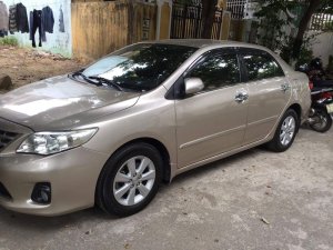 Toyota Corolla   2013 - Bán Toyota Corolla đời 2013, màu ghi vàng 