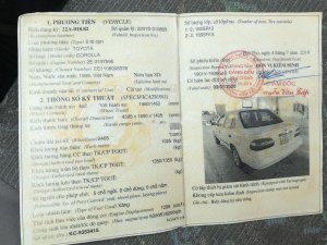 Toyota Corolla   1999 - Cần bán gấp Toyota Corolla đời 1999, màu trắng