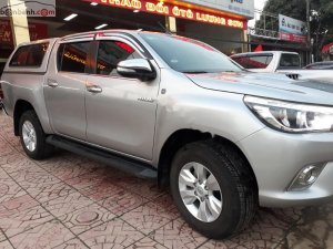 Toyota Hilux   2015 - Cần bán Toyota Hilux 3.0G 4x4 AT đời 2015, màu bạc, nhập khẩu 