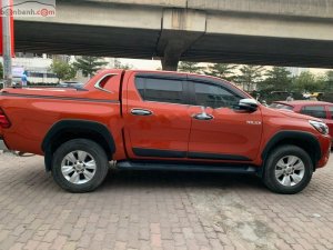 Toyota Hilux   2015 - Bán xe cũ Toyota Hilux 3.0G 4x4 AT năm 2015, màu đỏ, nhập khẩu