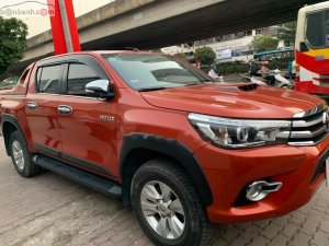 Toyota Hilux   2015 - Bán xe cũ Toyota Hilux 3.0G 4x4 AT năm 2015, màu đỏ, nhập khẩu