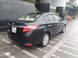 Toyota Vios 2016 - Bán gấp chiếc Toyota Vios đời 2016, màu đen, số sàn