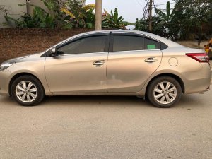 Toyota Vios 2017 - Cần bán lại xe Toyota Vios sản xuất 2017, màu vàng