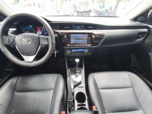 Toyota Corolla Altis 1.8G 2015 - Bán ô tô Toyota Corolla altis 1.8G đời 2015, màu đen