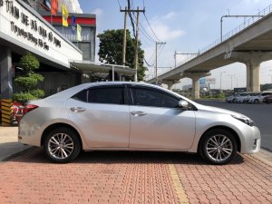 Toyota Corolla Altis 1.8G 2016 - Bán Toyota Corolla Altis 1.8G đời 2016, màu bạc