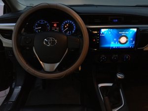 Toyota Corolla Altis 1.8 MT 2014 - Bán Toyota Corolla Altis 1.8 MT đời 2014, màu đen