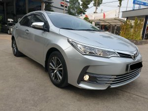 Toyota Corolla Altis 1.8G 2018 - Cần bán xe Toyota Altis 1.8G AT 2018 màu bạc, xe đi ít giữ kĩ chính hãng Toyota Sure