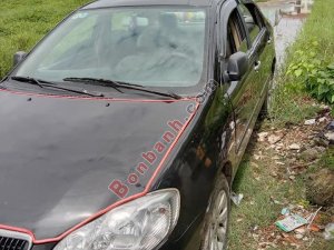 Toyota Corolla    2003 - Cần bán xe Toyota Corolla đời 2003, màu đen còn mới