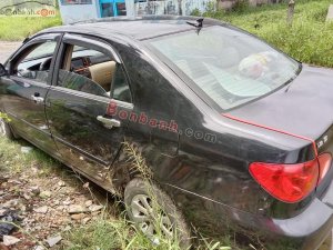 Toyota Corolla    2003 - Cần bán xe Toyota Corolla đời 2003, màu đen còn mới