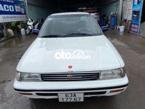 Toyota Corona 1990 - Bán Toyota Corona sản xuất 1990, màu trắng số sàn, 62tr