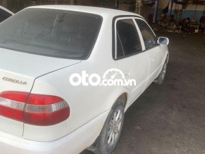 Toyota Corolla MT 1999 - Cần bán Toyota Corolla MT đời 1999, màu trắng, nhập khẩu  