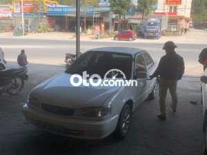 Toyota Corolla MT 1999 - Cần bán Toyota Corolla MT đời 1999, màu trắng, nhập khẩu  