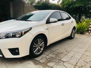 Toyota Corolla 2016 - Cần bán gấp Toyota Corolla G năm 2016, màu trắng