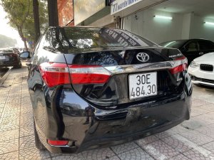 Toyota Corolla Altis 2017 - Bán gấp Toyota Corolla Altis 1.8G AT năm 2017, màu đen, còn nguyên dàn lốp, xe rất mới, giá tốt