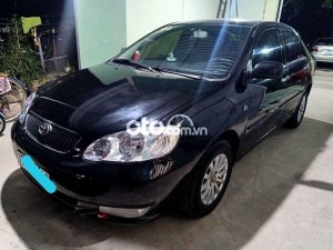 Toyota Corolla 1.8E MT 2004 - Cần bán Toyota Corolla 1.8E MT năm 2004, màu đen