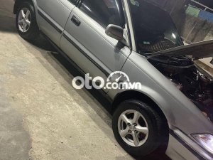 Toyota Corolla     1998 - Cần bán gấp Toyota Corolla sản xuất 1998, màu đen, xe nhập, giá tốt