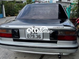 Toyota Corolla     1998 - Cần bán gấp Toyota Corolla sản xuất 1998, màu đen, xe nhập, giá tốt