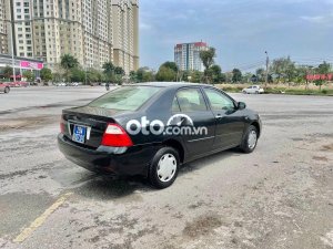 Toyota Corolla 2006 - Bán xe Toyota Corolla năm sản xuất 2006, màu đen, nhập khẩu, giá tốt