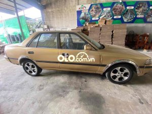 Toyota Corona 1989 - Bán Toyota Corona sản xuất 1989, màu vàng, xe nhập số sàn, giá 35tr