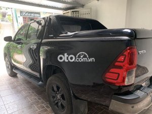 Toyota Hilux Bán xe  2.4E, màu đen, 1 cầu STĐ, ĐK T7/2021. 2021 - Bán xe Hilux 2.4E, màu đen, 1 cầu STĐ, ĐK T7/2021.