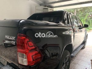 Toyota Hilux Bán xe  2.4E, màu đen, 1 cầu STĐ, ĐK T7/2021. 2021 - Bán xe Hilux 2.4E, màu đen, 1 cầu STĐ, ĐK T7/2021.