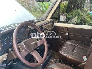 Toyota Land Cruiser 1986 - Màu trắng, 420tr