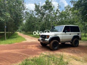 Toyota Land Cruiser 1986 - Màu trắng, 420tr