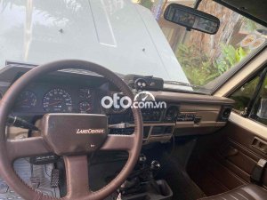 Toyota Land Cruiser 1986 - Màu trắng, 420tr