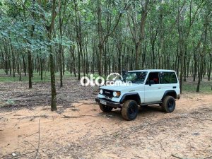 Toyota Land Cruiser 1986 - Màu trắng, 420tr