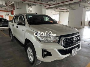 Toyota Hilux Bán xe bán tải   E2.4 AT , 2019 trắng 2019 - Bán xe bán tải toyota hilux E2.4 AT , 2019 trắng