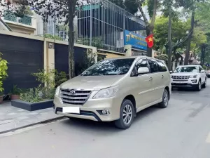 Toyota Innova 2.0E 2016 - Em cần bán innova sx 2016 bản 2.0E xịn màu vàng cát.