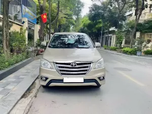 Toyota Innova 2.0E 2016 - Em cần bán innova sx 2016 bản 2.0E xịn màu vàng cát.