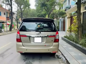 Toyota Innova 2.0E 2016 - Em cần bán innova sx 2016 bản 2.0E xịn màu vàng cát.