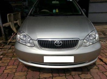 Toyota Corolla   MT 2006 - Bán ô tô Toyota Corolla MT năm 2006, màu bạc số sàn, giá 450tr