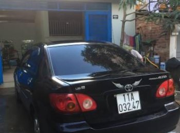 Toyota Corolla Altis   2003 - Bán xe Toyota Corolla altis đời 2003, màu đen chính chủ, 240 triệu