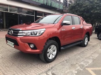 Toyota Hilux 3.0G 4x4 AT 2016 - Bán gấp Toyota Hilux G đời 2016, màu đỏ, nhập khẩu