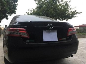 Toyota Carina 2010 - Cần bán lại xe Toyota Carina đời 2010, màu đen, xe nhập số tự động