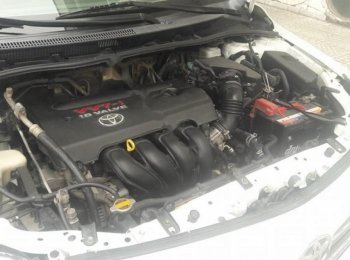 Toyota Corolla Altis 1.8G MT 2009 - Bán xe Toyota Corolla altis 1.8G MT 2009, màu trắng