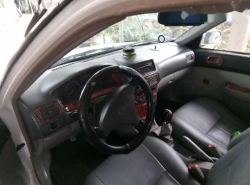 Toyota Corona 2001 - Cần bán lại xe Toyota Corona năm 2001, màu trắng, 135tr