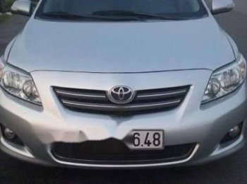 Toyota Corolla Altis 1.8 G  2009 - Bán Toyota Corolla altis 1.8 G đời 2009, màu bạc 