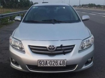 Toyota Corolla Altis G 2009 - Cần bán xe Toyota Corolla altis G đời 2009, màu bạc