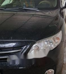 Toyota Corolla Altis 1.8T 2013 - Cần bán lại xe Toyota Corolla Altis 1.8T sản xuất 2013, màu đen chính chủ, 570tr