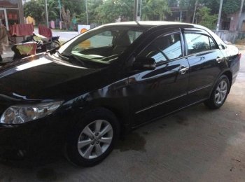 Toyota Corolla Altis 2009 - Cần bán xe Toyota Corolla Altis sản xuất năm 2009, màu đen, giá tốt
