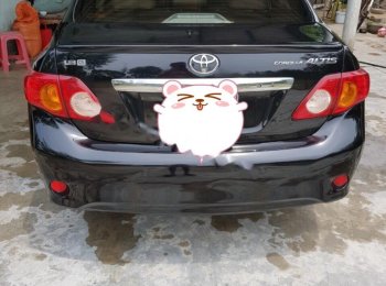Toyota Corolla Altis 2009 - Bán Toyota Corolla altis sản xuất năm 2009, màu đen số sàn, giá chỉ 385 triệu