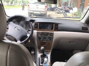 Toyota Corolla Altis 2002 - Cần bán xe Toyota Corolla Altis 2002, màu trắng xe gia đình