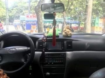 Toyota Corolla Altis   2004 - Gia đình bán Toyota Corolla altis 2004, màu đen