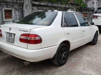 Toyota Corolla Altis 1999 - Gia đình bán Toyota Corolla altis 1999, màu trắng 